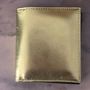 Le chateau Gold wallet. Unused.